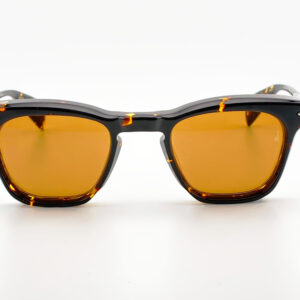 frame name is KENNEDY. lens color is orange.